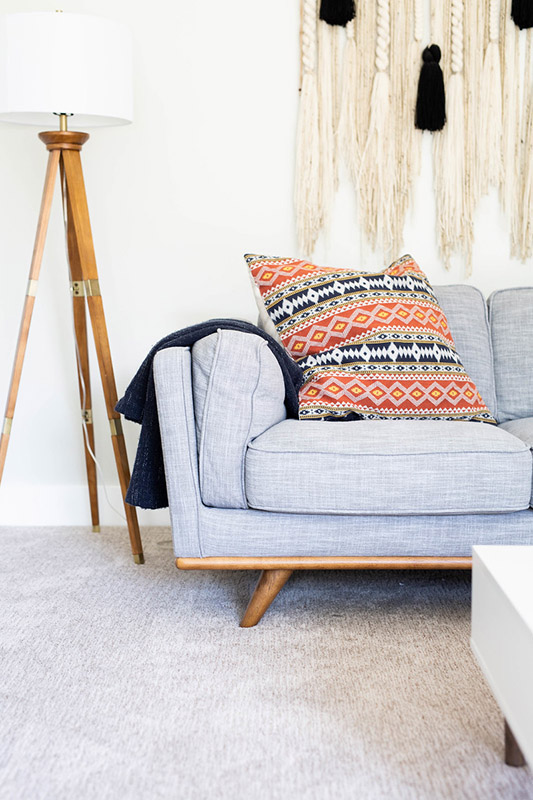 Gray fabric couch in living room looks brand new thanks to Zerorez.